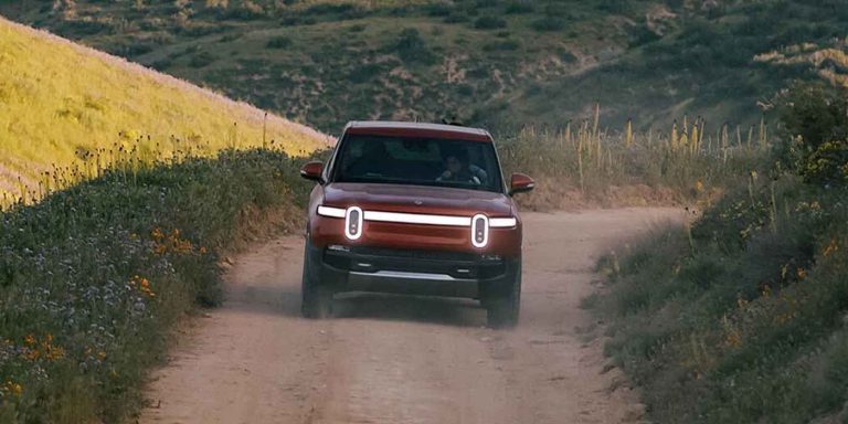 Rivian climbs aboard NACS train, offers Tesla Supercharger access